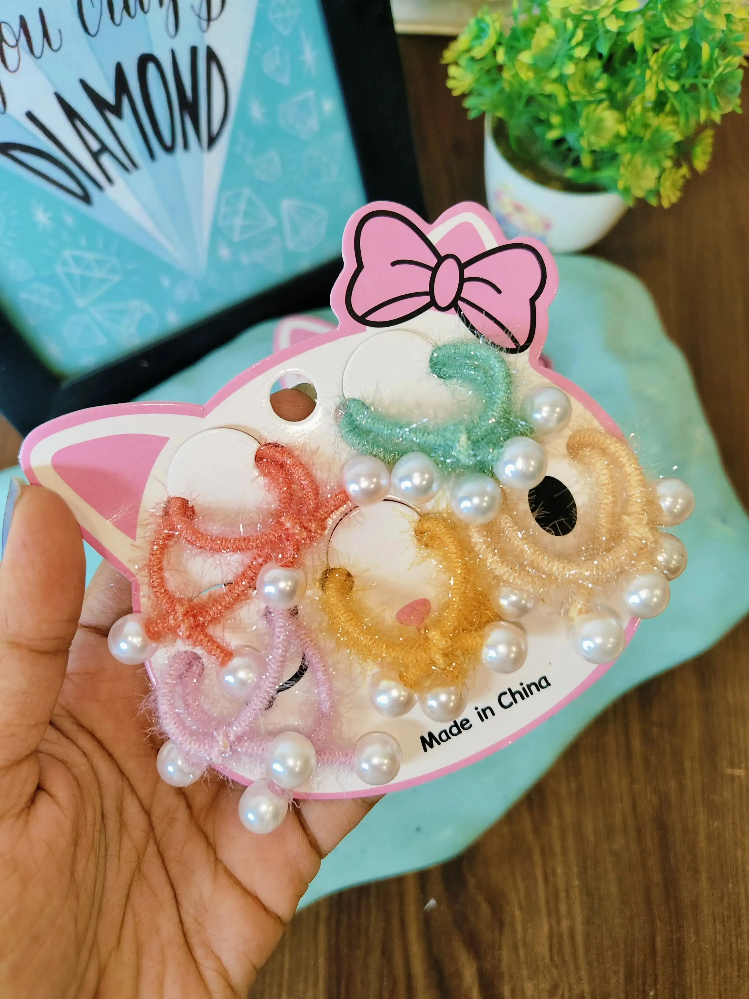 Pearl hair ties (5 pairs in one card)